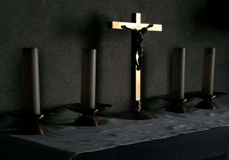 I like the light falling on the Light, at a small church in France. (photo by therockmom)